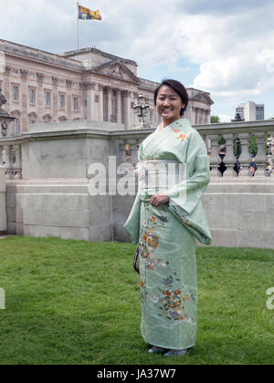 Japanese guest to a Royal Garden party in the grounds of Buckingham Palace London UK Stock Photo