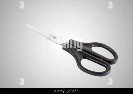 Scissors are hand-operated cutting instruments. Scissors are used for cutting various thin materials. Object isolated on white background Stock Photo