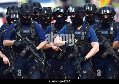 Armed police on St Thomas Street, London, near the scene of last night's terrorist incident at Borough Market. Stock Photo