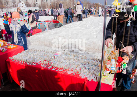 PERM, RUSSIA - March 13, 2016: Trade stalls with silver spoons in celebration of Maslenitsa Stock Photo
