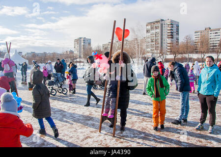 PERM, RUSSIA - March 13, 2016: Girl on stilts, the celebration of Carnival