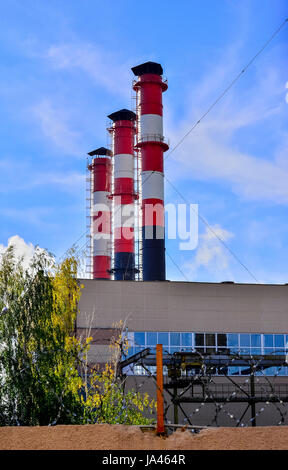 Pollution of atmospheric air from the chimneys of plants. Stock Photo