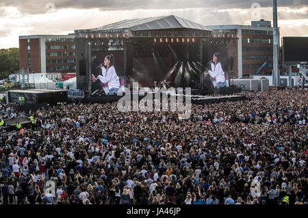 Ariana Grande performs during the One Love Manchester benefit concert for the victims of the Manchester Arena terror attack at Emirates Old Trafford, Greater Manchester. Stock Photo