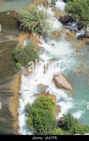 Top view of waterfalls. Mijares river, in the province of Castellon (Valencian Country - Spain). Beautiful color of his clear waters. Sunny day Stock Photo