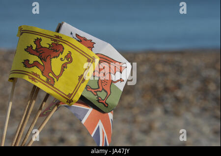 Sandcastle flags on an English beach Stock Photo