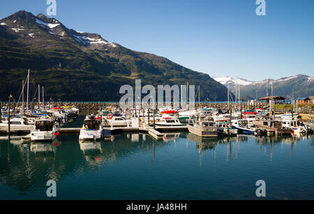 WHITTIER, ALASKA/UNITED STATES – AUGUST, 5: Boats are moored at the marina and are very protected in this harbor surrounded by mountains on 08/20/15 i Stock Photo