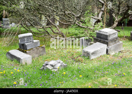 broken tombstones in cemetery in saginaw MI. Stock Photo