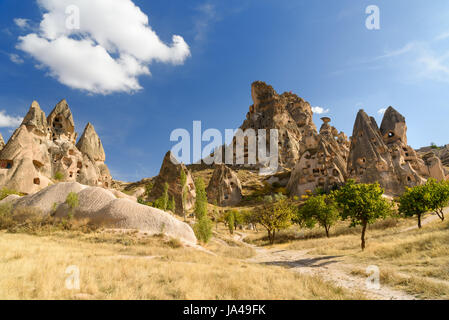 View of Uchisar castle in rock formation from Pigeon valley. Cappadocia. Nevsehir Province. Turkey Stock Photo