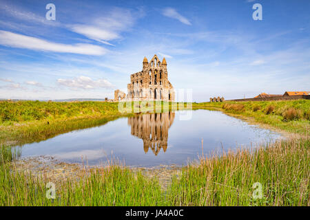 Whitby Abbey, Whitby, North Yorkshire, reflected in a pool. Stock Photo