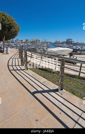 PALMA DE MALLORCA, BALEARIC ISLANDS, SPAIN - APRIL 10, 2016: Bike route and fence Portixol on April 10, 2016 in Palma de Mallorca, Balearic islands, S Stock Photo