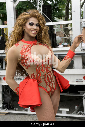 A transgender woman performer  in an elaborate costume at the Queens Pride Parade in Jackson Heights, Queens, New York. Stock Photo