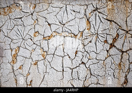 White wall in the cracks, like flowers Stock Photo