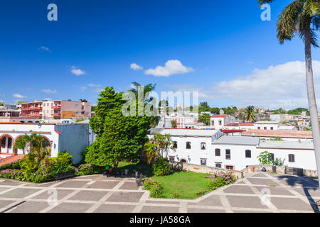 Santo Domingo,  Dominican Republic. Plaza de Espana, street view with palms and houses Stock Photo