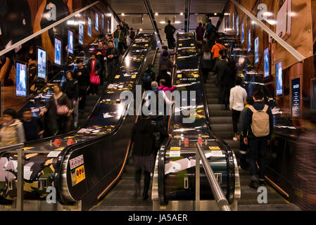 Horizontal view of people on the escalators at the MTR, mass transit railway, in Hong Kong, China. Stock Photo