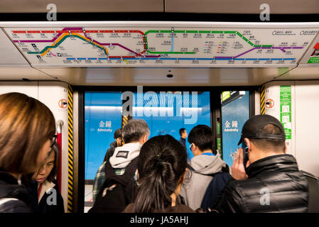 Horizontal view of passengers inside the MTR, mass transit railway, in Hong Kong, China. Stock Photo