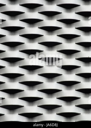 metal grid material with semi circular perforations Stock Photo