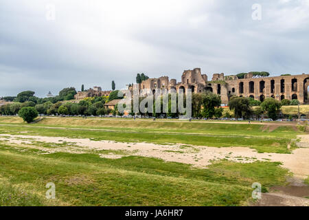 View of Palatine Hill and Imperial Palace from Circus Maximus field (an ancient chariot racing stadium) - Rome, Italy Stock Photo