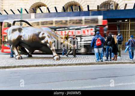 NEW YORK - FEBRUARY 5: Charging Bull sculpture near Wall Street in New York on February 5, 2010. Architect Di Modica spent about US$360000 to create, cast, and install the sculpture in 1987 Stock Photo