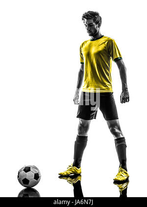 one brazilian soccer football player young man in silhouette studio  on white background Stock Photo