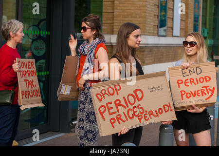 London, UK. 24th August, 2017. Campaigners outside an Asda supermarket in Stepney Green call on the supermarket to reduce its prices for tampons to bring it into line with other supermarkets which have reduced prices to offset the 'tampon tax'. Credit: Mark Kerrison/Alamy Live News Stock Photo