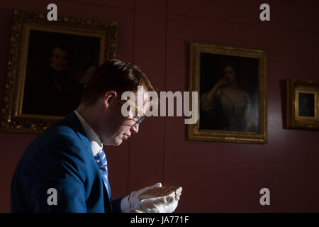 (170825) -- SYDENY, Aug. 25, 2017 (Xinhua) -- Photo taken on April 17, 2017 shows Dr. Daniel Mansfield, an Australian mathematician who deciphered the Babylonian clay tablet in New York, the United States. The mystery of a famous 3,700-year-old Babylonian clay tablet, once owned by the real 'Indiana Jones,' has been unlocked by Daniel Mansfield. It was revealed on Aug. 25, 2017. (Xinhua/University of New South Wales) (dtf) Stock Photo