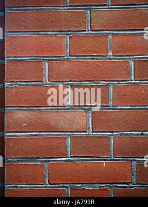 texture of old aged wall made of red brick and cement, pattern, Stock Photo