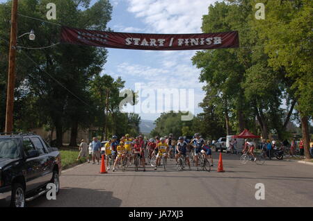 Spring City, Utah, USA - 2 August 2006: Starting line for the Sanpete Classic Road Race in Sanpete County. Riders wait at the start line under the sta Stock Photo