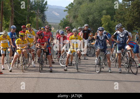 Spring City, Utah, USA - 2 August 2006: Men sitting on their road bikes waiting for the start the Sanpete Classic Road Race.Cyclists waiting at the st Stock Photo