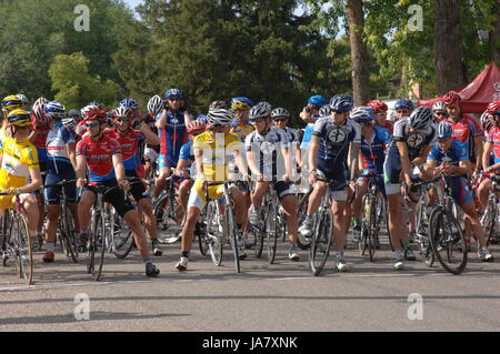 Spring City, Utah, USA - 2 August 2006: Group of cyclists waiting for the the Sanpete Classic Road Race in Sanpete County Utah to begin. Men standing  Stock Photo