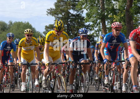 Spring City, Utah, USA - 2 August 2006: Group of cyclists riding down Main Street in the Sanpete Classic Road Race in Sanpete County Utah in Spring Ci Stock Photo