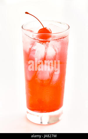 Isolated red cocktail in tall glass with ice and a maraschino cherry Stock Photo