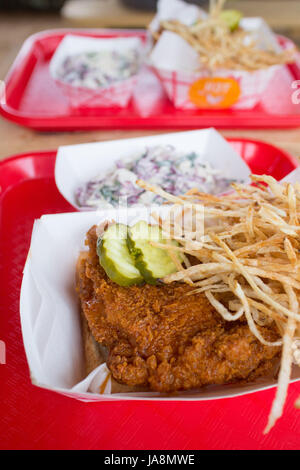 Nashville fried chicken with fries and coleslaw Stock Photo