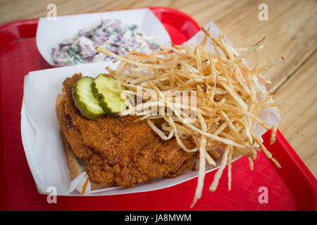 Nashville fried chicken with fries and coleslaw Stock Photo