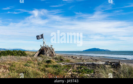 Some wonderful beach maori carving at Otaki Beach. Stock Photo