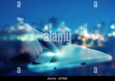 Hand touching tablet pc, social media concept Stock Photo
