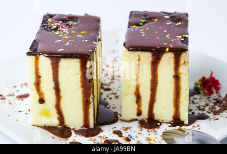 Cream pie with chocolate on a plate Stock Photo