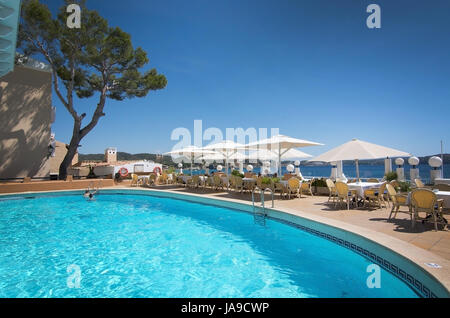 CALA FORNELLS, MALLORCA, SPAIN - SEPTEMBER 6, 2016: Pool at The Grand Tortuga restaurant with ocean view on a sunny day on September 6, 2016 in Cala F Stock Photo