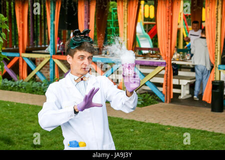 Kiev, 29th of May 2016 : An artist doing"Crazy professor" performance during "AH-day" festival. Stock Photo
