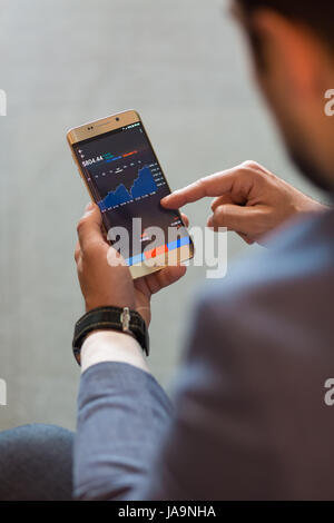 Close up of businessman using mobile smart phone. Stock Photo