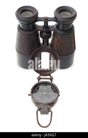 Isolated objects: old compass and binocular on white background Stock Photo