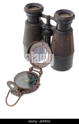 Isolated objects: old compass and binocular on white background Stock Photo