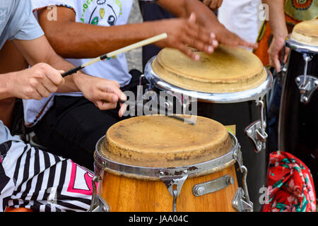 Percussion instrument called atabaque being played in traditional Brazilian party Stock Photo