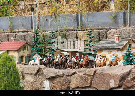 Model horse-riding group diorama section of the Charnwood Forest Garden Railway, an attraction at Rothley station on the Great Central Railway heritag Stock Photo