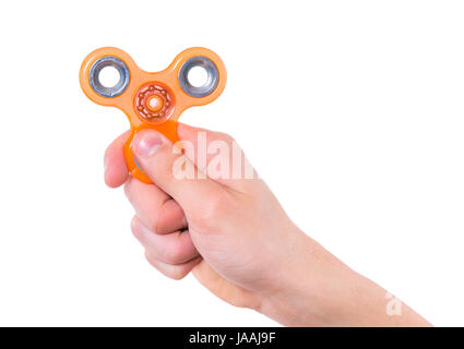 Hand with spinner toy Stock Photo