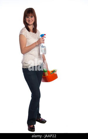 Young woman with windows cleaner and a bucket filled with cleaning materials  isolated on white background Stock Photo