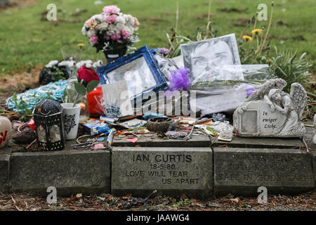 Ian Curtis' memorial stone at  Macclesfield Crematorium in Macclesfield, Cheshire, UK. The English singer-songwriter and musician was best known as th
