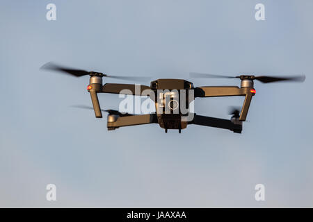 Drone aircraft camera flying closeup blue sky. Stock Photo