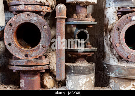 Pipes in abandoned factory Stock Photo