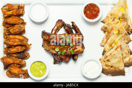 Overhead of an appetizing platter of finger food served in classy restaurant Stock Photo
