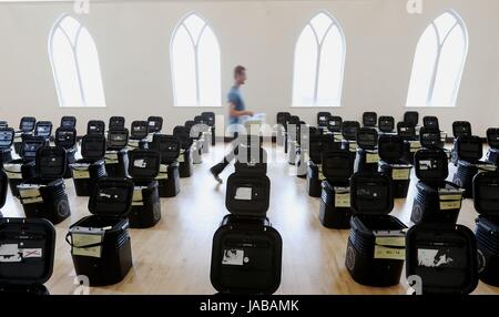 Ballot Boxes are gathered at Glengormley Methodist church in Belfast ahead of the General Election. Stock Photo